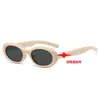 Gafas de sol de moda europea y americana, marco ovalado pequeño con patillas de estrella, cara lisa adelgazante, versátiles, estilo ojo de gato, para chica popular, transfronterizas