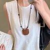Colar com Pingente de Bolsa Tecida Minimalista Corrente para Suéter de Moda de Alto Padrão Nicho Versátil Temperamento Joias da Moda Atacado