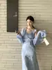 Xiu Xixi Treze Linhas 2026 Primavera Novo Cartão Branco Lã Mohair Tricô Cardigan Jaqueta Versátil Top 25575