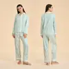 Ropa de casa para mujer estilo étnico patrón de satén fina manga larga transfronteriza conjunto de pantalones largos para mujer gasa nuevo estilo Carter