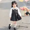 Vestido de lunares con lazo y cuello de muñeca estilo coreano para niña, nuevo modelo primavera y otoño 2026, conjunto de dos piezas para niñas pequeñas