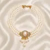 Nuevo conjunto de joyería transfronterizo, moda europea y americana, estilo vintage francés, collar y pendientes de borla con cuentas de perla de imitación y pedrería para mujer