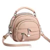 Bolso de hombro y bandolera nuevo de cuero suave transfronterizo, gran capacidad, textura de moda, moderno y versátil, adecuado para ir al trabajo, bolso de mano redondo pequeño para mujer