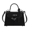Bolsa de tendência transfronteiriça feminina bolsa de verão 2024 novo estilo moderno elegante bolsa transversal textura de pedra bolsa Kelly