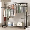 Perchero de pie para uso doméstico, adecuado para dormitorios, móvil, de color crema, diseño simple, ideal para habitaciones de estudiantes, tendedero de balcón, tipo de pie