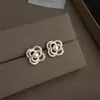 Pendientes Pequeños Minimalistas con Circonita Microincrustada de Personalidad Nicho, Elegantes y Sofisticados, Fuente de Suministro de Joyería Boutique, Fábrica de Pendientes