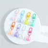 Acessório de chaveiro pingente de fone de ouvido 3D pequeno da moda, fofo e versátil, decoração de bolsa, acessório de chaveiro para presente pequeno atacado