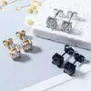 Brincos clássicos de fundição a quente com zircônia redonda de quatro garras para homens e mulheres