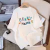 Camiseta de Manga Corta de Algodón Puro para Mujer Verano 2025 Nueva Moda Suelta Adelgazante Camiseta Diseño con Sentido Nicho Top para el Cabello