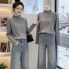 Top cinza simples e elegante estilo executivo para mulheres 2026, cardigã base de jacquard fino vazado com gola semimalta, tricotado