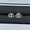 Brincos Chanel Letra Duplo C Estilo Novo 2025 para Mulheres, Argola Trançada de Luxo de Alta Qualidade com Pino de Prata Atacado