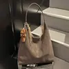 Bolsa de Grande Capacidade para Mulheres 2025 Nova Moda Nicho Outono e Inverno Versátil Bolsa de Ombro Bolsa Tote de Alta Qualidade para o Dia a Dia