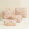Grande capacidade acolchoado bolsa cosmética floral conjunto de quatro peças armazenamento portátil algodão pano lápis estojo três peças conjunto ins viagem