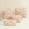 Bolsa de Maquillaje Acolchada Súper Nueva de Gran Capacidad Juego Floral de Cuatro Piezas Bolsa de Almacenamiento Neceser Interior de Algodón para Lápices Ins Viaje