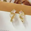 Pendientes Únicos de Metal Estilo Frío con Circonita Trenzados Personalidad y Temperamento Pendientes de Alta Gama Versátiles Pendientes de Moda de Lujo Ligero
