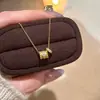 Nuevo collar caleidoscopio de trébol de cuatro hojas para mujer, moderno y de lujo ligero, lleno de diamantes, cadena fina para la cintura y la clavícula, diseño de nicho, estilo simple