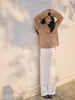 Tienda Insignia Shanghai Dan Nong/Otoño/Invierno 2026 Nuevo Suéter de Lana Cachemira con Acabado Cepillado de Cuello Redondo y Manga Larga para Mujer