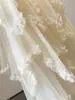 Saia Irregular de Renda para Bolo para Mulheres, Novo Estilo Verão 2026, Saia de Cintura Alta em Linha A de Comprimento Médio que Cobre os Quadris, com Barra Larga Evaseada e Design Bufante