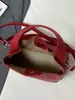 Bolso Cubo de Mano de Nicho Estilo Coreano para Mujer 2026 Primavera Nuevo Moda Bolso de Hombro Único Bolso Cruzado Simple de Alto Valor