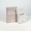 Livro falso moderno minimalista com tema de cidade, livro de exibição de luxo leve americano, peça decorativa para mesa de centro de sala de estar, modelo de livro de decoração suave