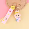 Llaveros de muñeca de goma blanda de PVC, al por mayor, llaveros de personaje de dibujos animados creativos en 3D, pequeños adornos para mochilas de estudiantes