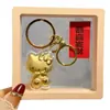 2026 Novo Pingente Dourado Versão Mini Gato Kt Corda Trançada Vermelha e Rosa Pingente Pequeno para Loja Física e Promoção de E-commerce