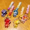 Astronauta Jelly Bean Botella Flotante Colgante para Mochila Astronauta de Dibujos Animados Llavero para Coche Regalo Pequeño para Pareja Venta al Mayoreo