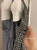 Wgwe9097 Ropa de Mujer Guangzhou Shisanxing Verano Nueva Camisa sin Mangas con Parche de Volantes a Cuadros y Tirantes de Moda