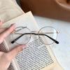 2023 Nuevo Armazón de Metal para Lentes Unisex Retro Redondo Armazón Liso Espejo Estudiante Miopía Armazón de Lentes