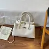 Bolso de mano de lujo ligero transfronterizo para mujer, nuevo, elegante, retro, para el trabajo, tipo cubo, versátil, de nicho, de un solo hombro, cruzado, moderno