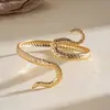 Pulsera geométrica abierta con forma de serpiente de metal creativa europea y americana, brazalete de brazo personalizado de alta gama transfronterizo, joyería nicho para mujer en Instagram