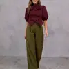2026 Europeu e Americano transfronteiriço comércio exterior cor sólida design manga de lanterna com laço blusa casual gola alta camisa curta para mulheres