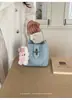 Bolso de mano para mujer transfronterizo, nuevo estilo coreano primavera-verano, bolso de hombro tipo cubo de moda con un toque de alta gama, bolso cruzado versátil