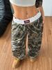 Pantalones casuales de moda transfronteriza 2025 para mujer, diseño estampado con estampado de ramas, holgados, largos y combinables.
