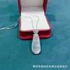Nova Corrente de Clavícula com Pingente de Feijão Branco Cristalino de Calcedônia Pequeno Quatro Estações com Diamante Pingente de Jade Feminino Atacado