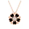 Collar de Plata de Ley S999, Cadena para Clavícula Flor de Durazno de Diez Millas, un Collar de Trébol de Cuatro Hojas de Lujo Accesible de Doble Uso al por Mayor