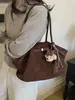 Bolsa tote de camurça casual e elegante, novo modelo de inverno 2026, alto valor estético, bolsa de ombro simples para mulheres