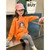 Camiseta Base de Dibujos Animados para Niñas Primavera y Otoño 2026, Nueva y Elegante Camiseta de Manga Larga Versión Coreana para Niñas