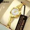 Mokago relógio feminino versátil temperamento mostrador madrepérola pulseira de metal relógio incrustado com strass formato de coração moderno relógio de quartzo atacado