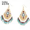 Pendientes bohemios étnicos retro transfronterizos con cuentas de arroz MGB y borlas de diamantes tejidas a mano para mujer
