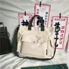 Bolso de Hombro para Mujer y Hombre 2026 Nueva Moda Nicho Color Sólido Bolso de Clase para Estudiantes Gran Capacidad Lona Casual Bolso Cruzado