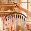 Cabide de roupas multifuncional em formato de abóbora amarela com prendedores e tiras antiderrapantes, ideal para secar roupas na varanda.