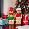 Decoraciones navideñas transfronterizas: figuras de hombre de galleta de pie, muñecos de hombre de jengibre, regalos de Navidad, adornos para ventana y mesa