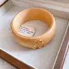 Pulsera triangular de madera con remaches redondos, transfronteriza europea y americana, pulsera de muñeca simple y elegante para el día a día, joyería de nicho con diseño único