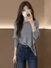 Llegó. Nuevo conjunto de dos piezas irregular de punto de manga larga elegante, ajuste ceñido, efecto ilusión, para principios de otoño, en color gris, de la fábrica original