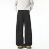 Pantalones deportivos casuales nuevos de corte holgado para jóvenes, pantalones negros de estilo americano fluidos para otoño, pantalones largos de pierna ancha con pliegues modernos para hombre