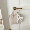 Bolso de Cubo Tejido Personalizado para Mujer 2026 Nuevo Llegada de Verano Bolso de Mano con Temperamento Elegante Bolso Cruzado de Moda para Viajes