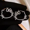 Pendientes de Gatito Huecos con Lazo de Zirconia Moda Simple Hebilla de Oreja de Gama Alta Versátil Temperamento Pendientes de Nicho Venta al por Mayor