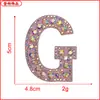 En stock paño en polvo color letra de pedrería insignia parche para bebé pegatinas de tela accesorios para ropa fabricantes de accesorios suministro directo