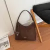 Bolso bandolera retro diseño de nicho de moda para mujer 2026 bolso de hombro único moderno bolso tote casual para el día a día debajo del brazo